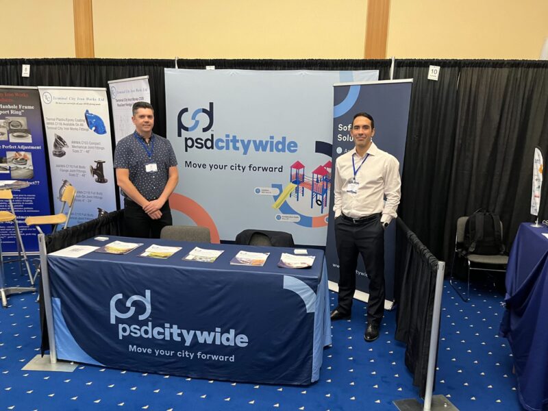 PSD Citywide sales staff in our booth at a conference.