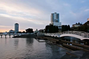 City skyline along waterfront with footbridge in downtown Nanaimo, British Columbia, Canada.