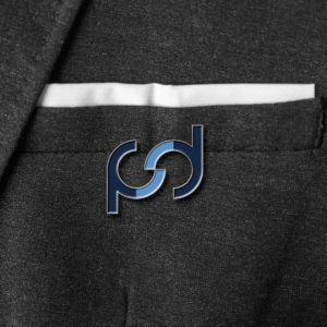 Close up of blazer pocket with enamel PSD Citywide icon pin.