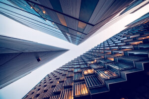 View of sky scraper building from below.