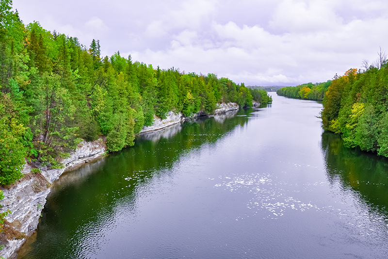 Trent river with cloudy skies in Campbellford, Ontario, Canada.