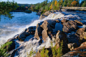 Waterfall in autumn forest at High Fall Park, Bracebridge, Ontario, Canada