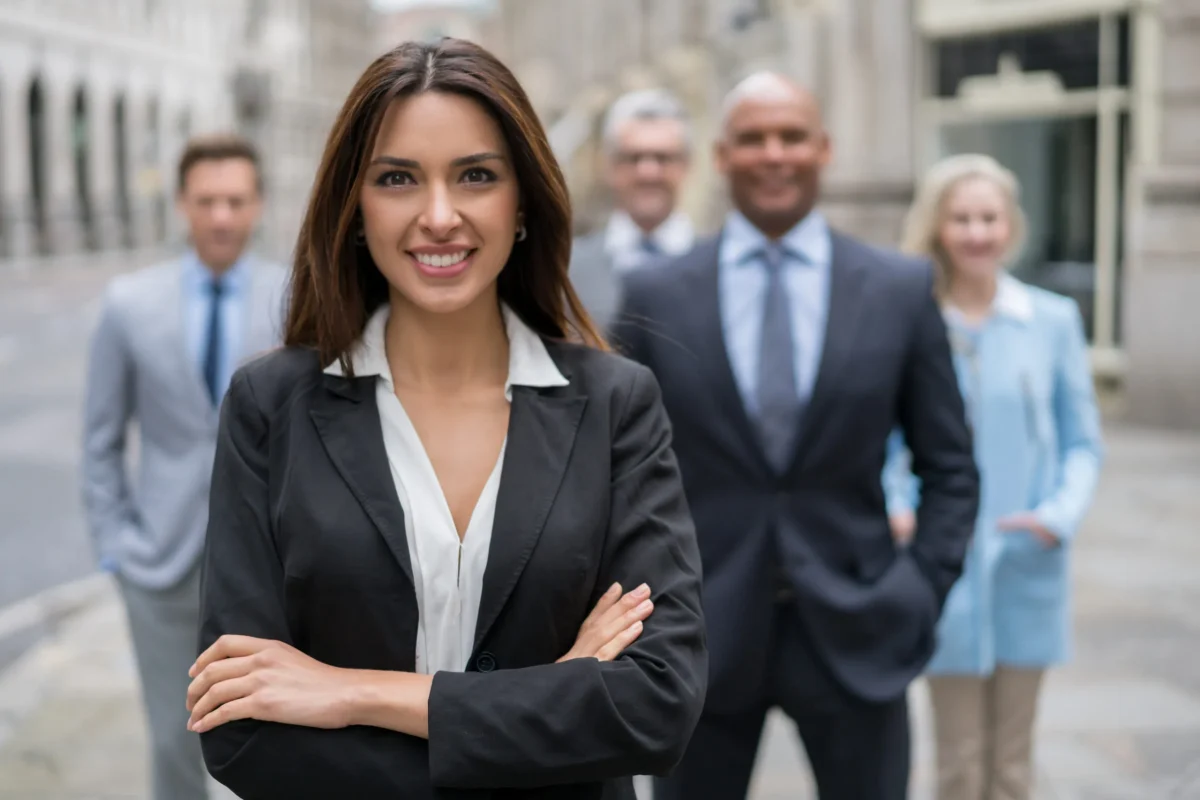 Group of smiling, confident asset management advisors.